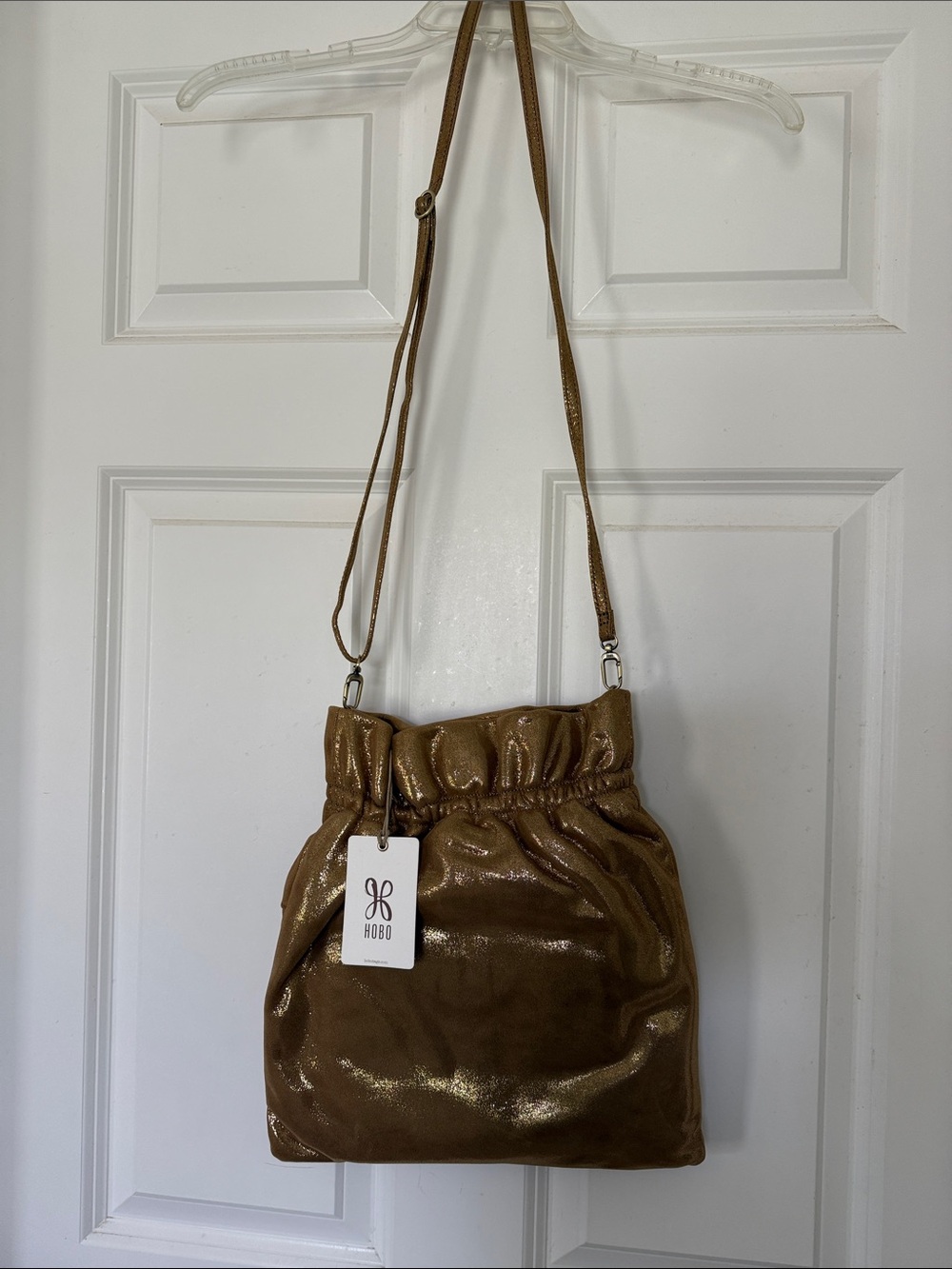 HOBO Shimmering Bronze Drawstring Crossbody Bag
